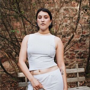 White and blue plaid tank top with a square neckline and slim fit